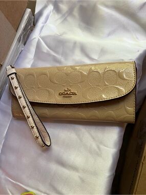 Coach Beige Patent Leather Wristlet Clutch with Studded Strap NWT